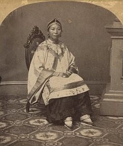 An early photograph of a Han woman wearing leggings and lotus shoes (c. 1865; courtesy of the Library of Congress, LC-DIG-stereo-1s05251).