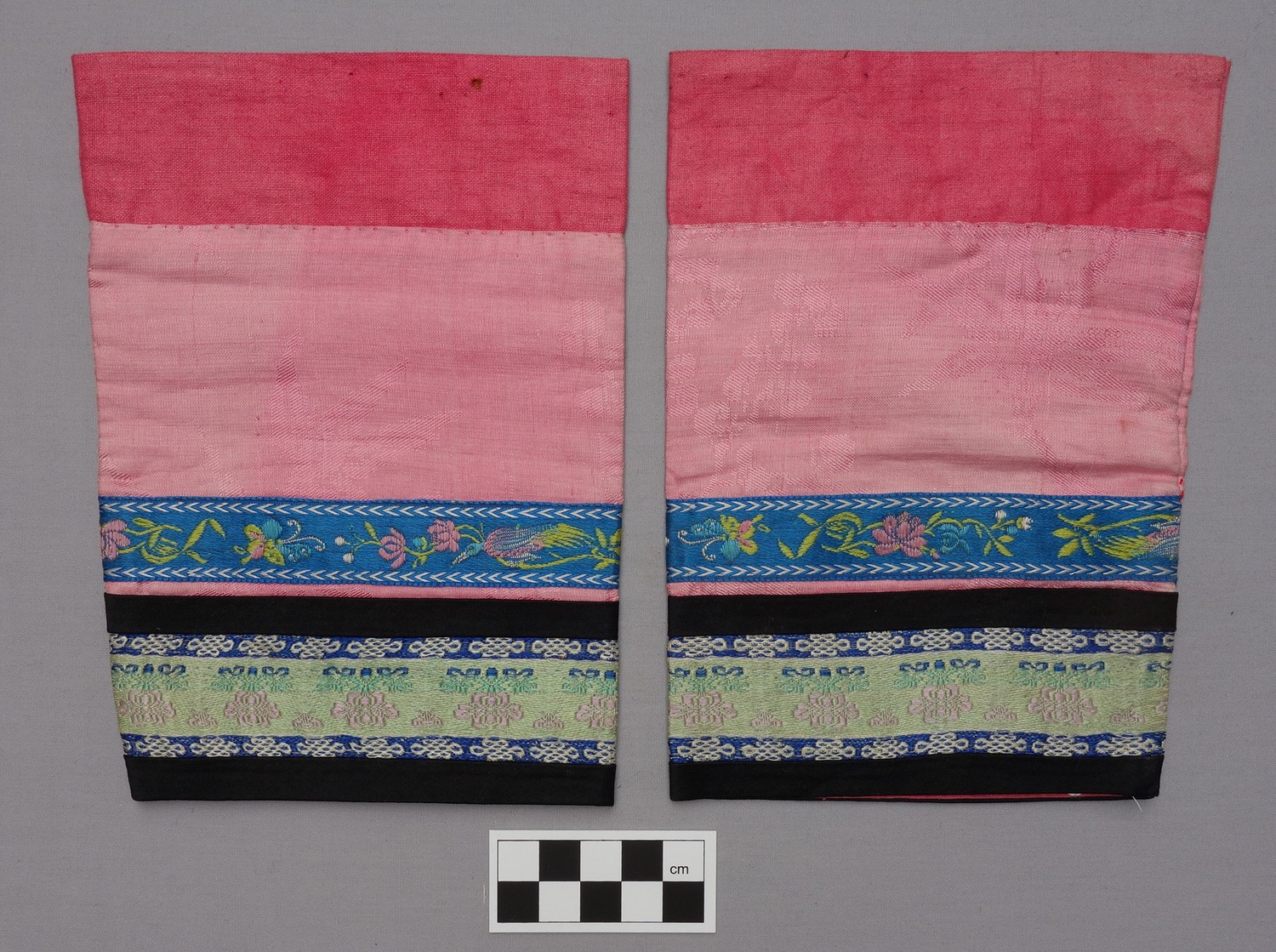 Pair of leggings worn with a pair of lotus shoes (late 19th century; TRC 2013.0063c-d).