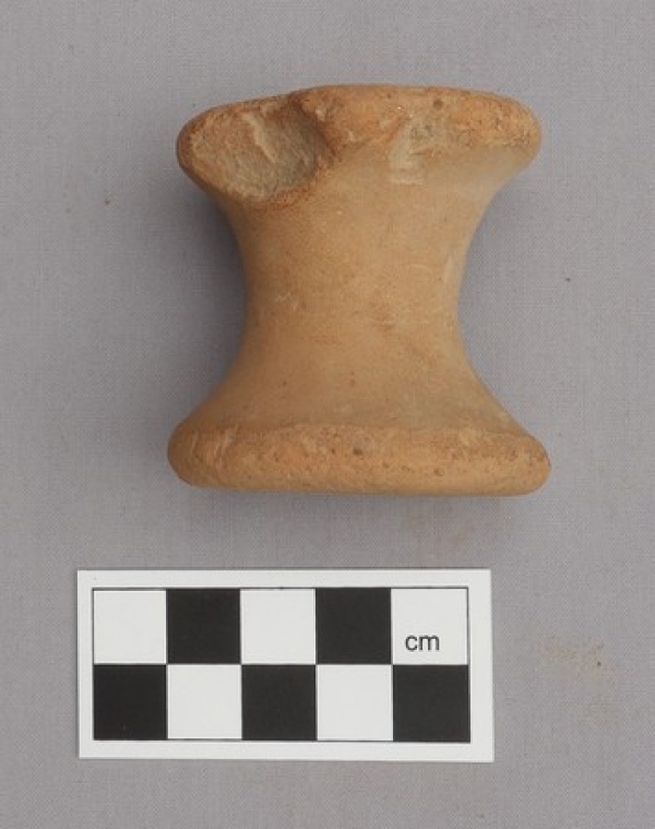 Ancient Greek bobbin made of clay, 