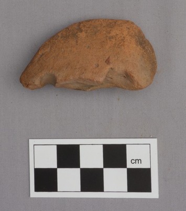 Archaic Greek loom weight, made of clay.