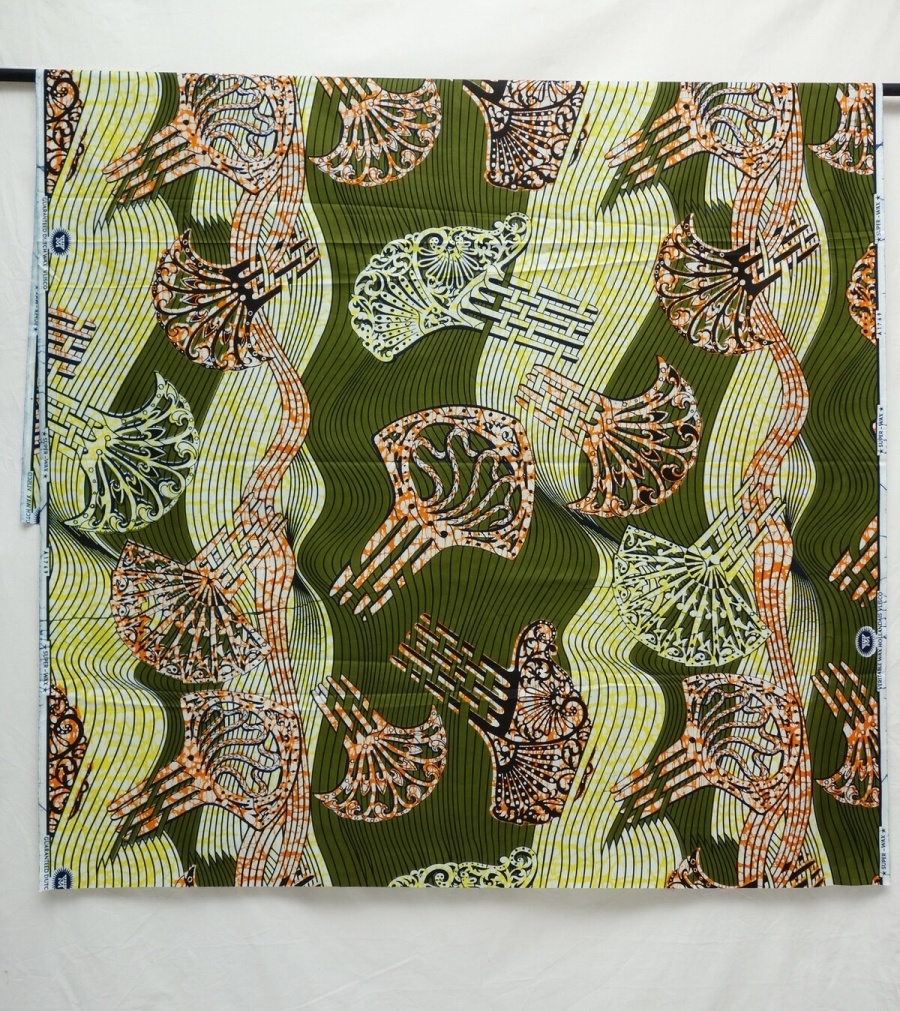 Vlisco cloth with a design of Indonesian-style hairpins on a green ground, early 21st century.