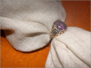 Shahtush shawl, being passed through a ring.