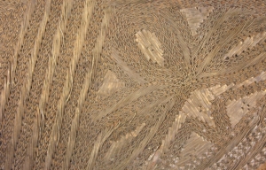 Close-up of metal thread embroidery on a leather sheath for a dagger. The metal threads used include plate and wire forms (late 20th century; Oman).