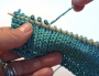Example of frogging a piece of knitting.