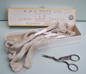 Box with linen lace thread from the firm of W &amp; J Knox, 1920's.