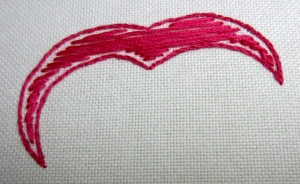 Example of the use of a padded satin stitch.