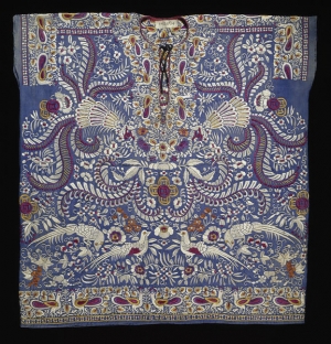 A Parsee girl&rsquo;s tunic (jubla) embroidered with birds, flowers and plants in silk thread on a mid-blue ground (Surat, India, c. 1870