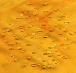 Link powdering stitch with hand dyed embroidery thread on satin silk.