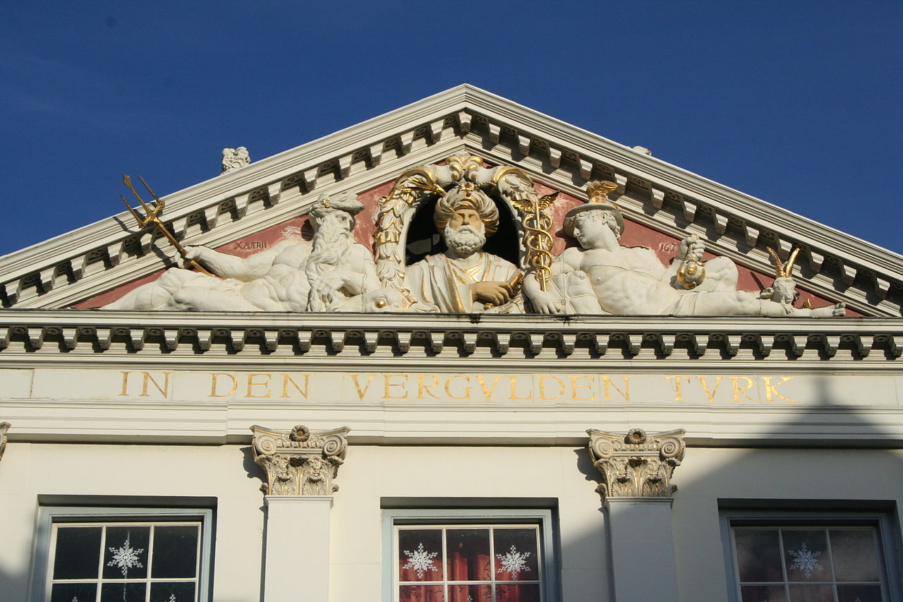Pediment of In den Vergulden Turk (AD 1673), Breestraat, Leiden. The Angora goat can be seen to the right. Photograph courtesy Robbiedoes.