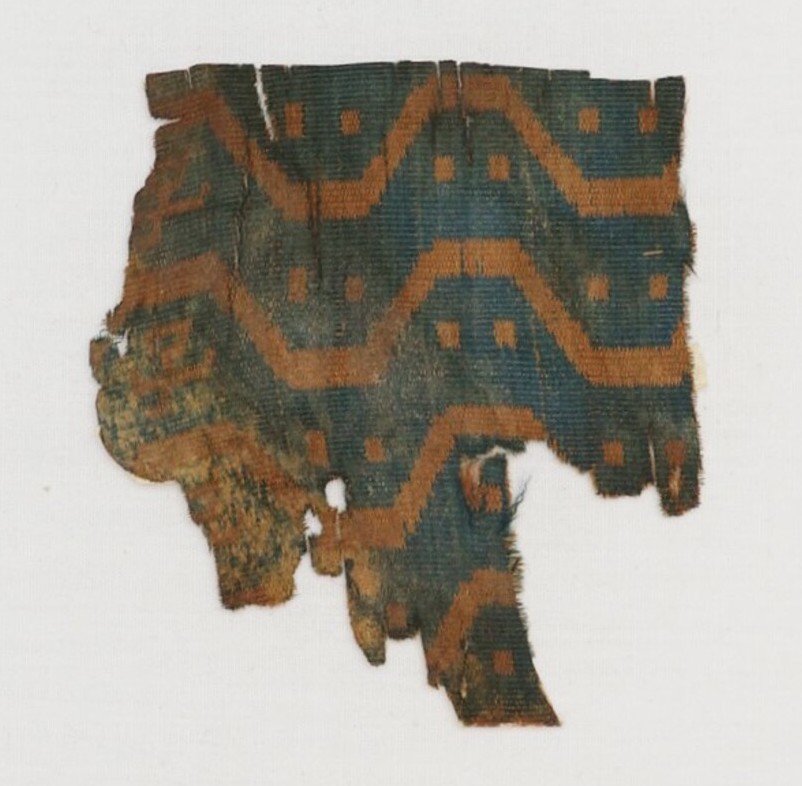 Small fragment from the TRC collection, of a warp-faced compound weave, Niya (?), Xinjiang, China, 3rd century BC - 3rd century AD (TRC 2000.0009).
