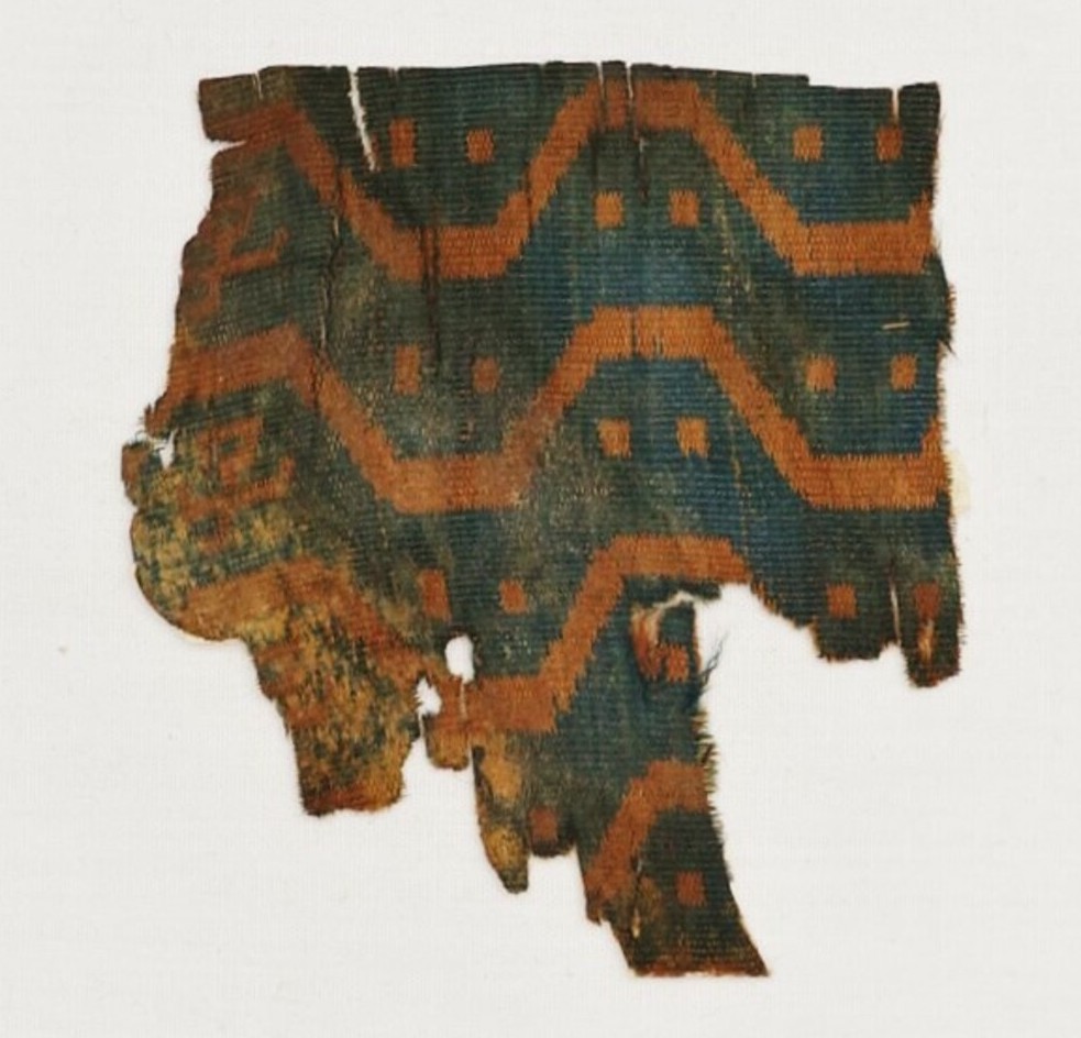 Small fagment of silk cloth (warp-faced compound cloth), China/Silk Road, c. 2nd century AD (TRC 2000.0009).