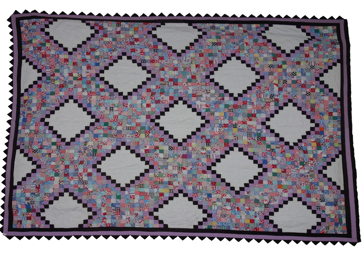 Postage stamp quilt (USA, 1930s). TRC 2017.4253.