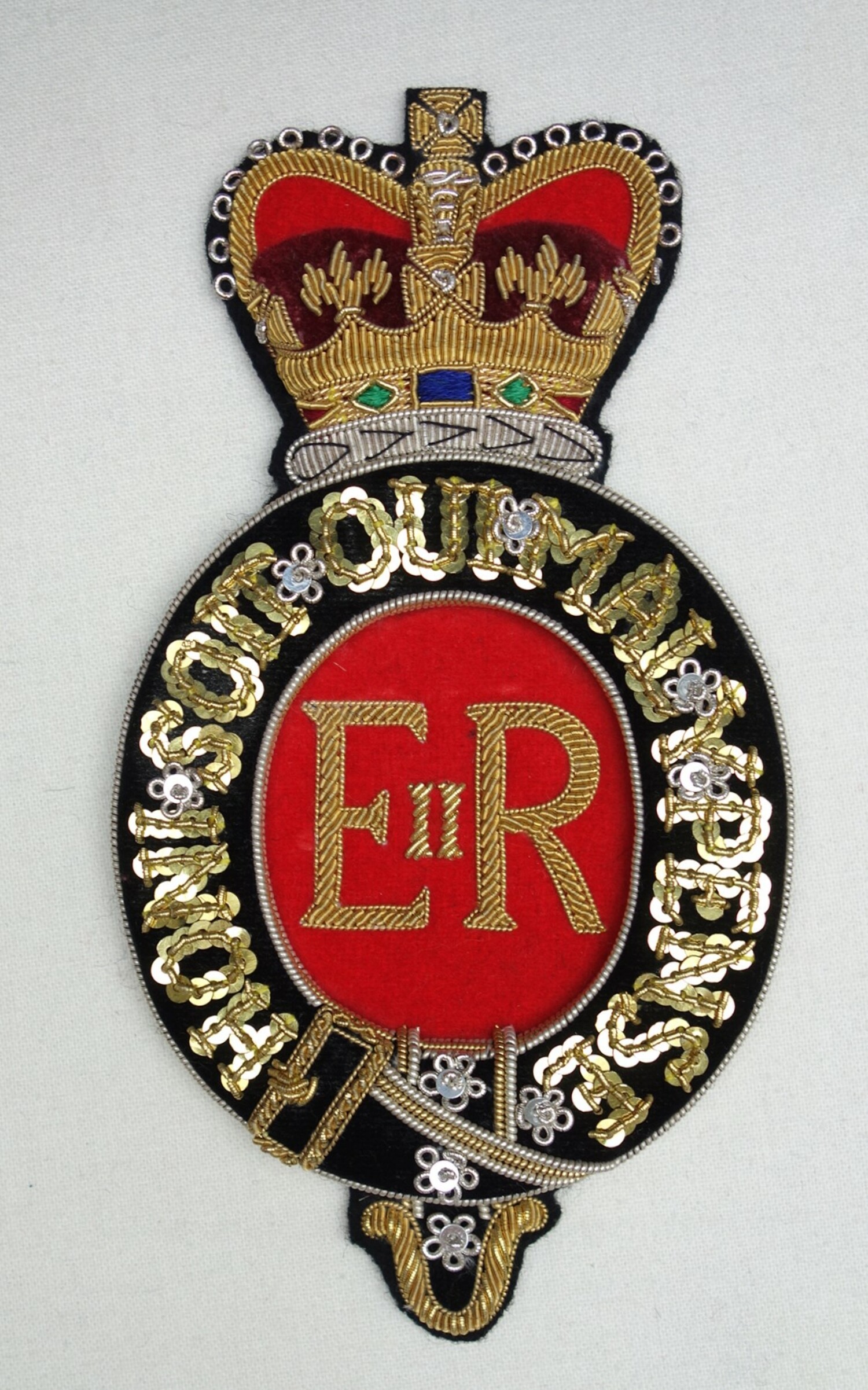 Embroidered insignia for a Royal postillion, produced by Hand&Lock, 2019 (TRC 2019.1808).
