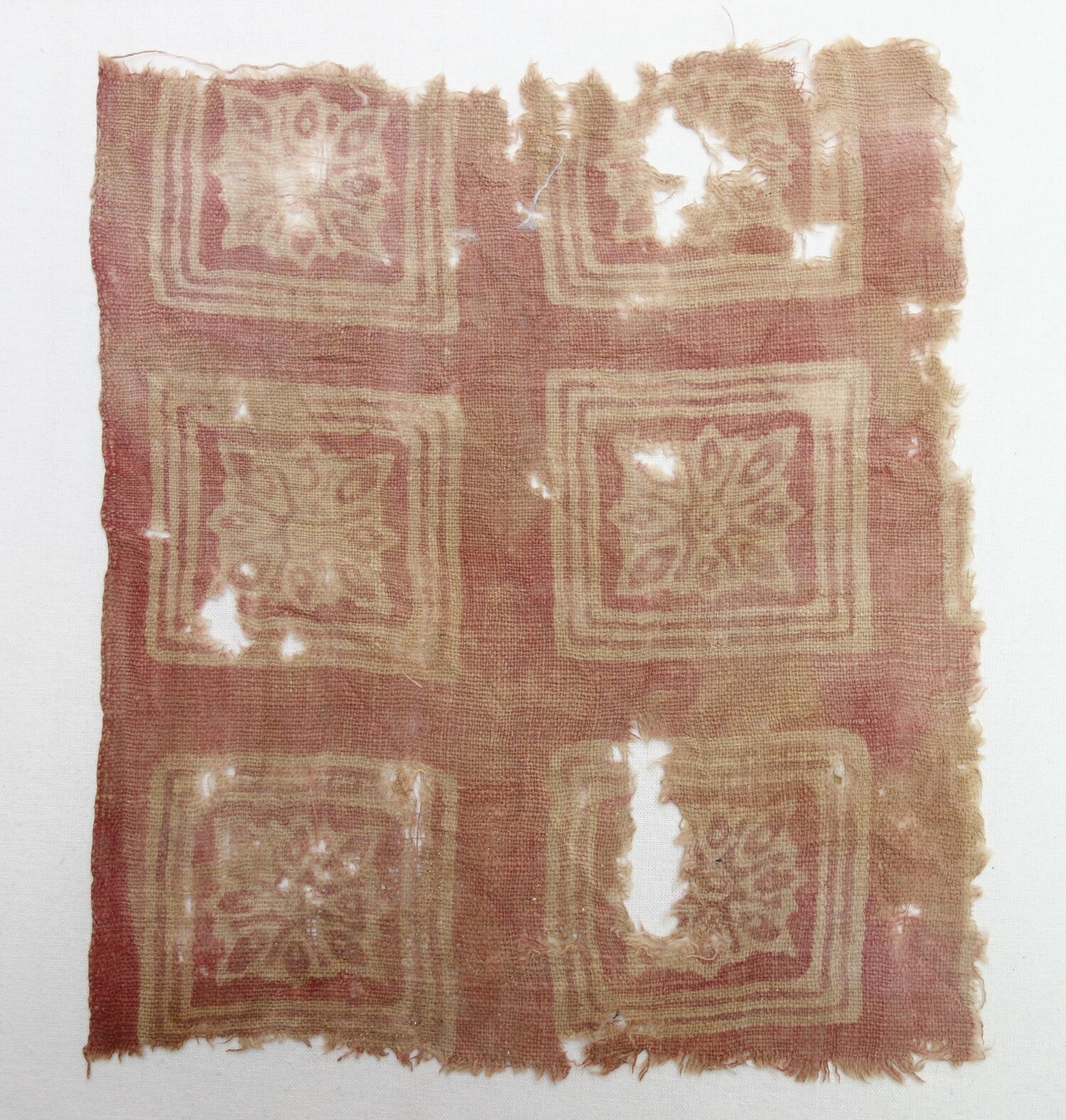 Fragment of a block printed textile using a resist technique, India, 14th century. The textile came from the 1980 excavations at Quseir al-Qadim, Egypt (TRC 2020.0251).