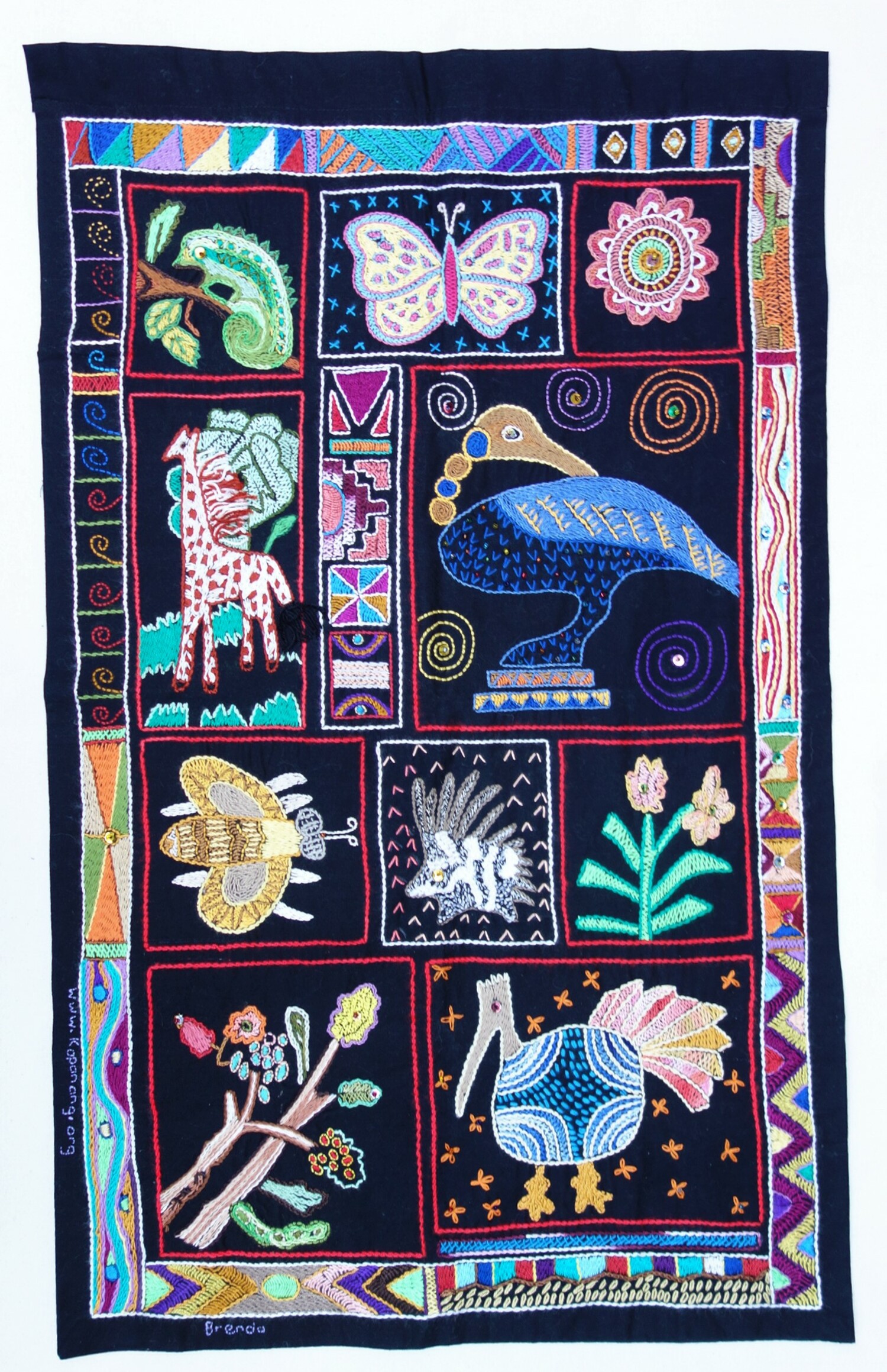 Embroidered panel with flowers, birds, and animals, South Africa, early 21st century (TRC 2021.0189). 