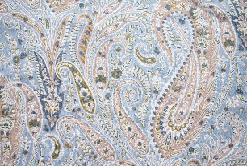 Detail of a sample of Liberty's Felix Raison-Pewter design, with paisley motifs, on a linen ground, used for furnishings (TRC 2021.0636).