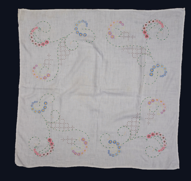 Afternoon table cloth embroidered at Scapa Flow, Orkney Islands, Scotland, early 1940s (TRC 2021.1333).