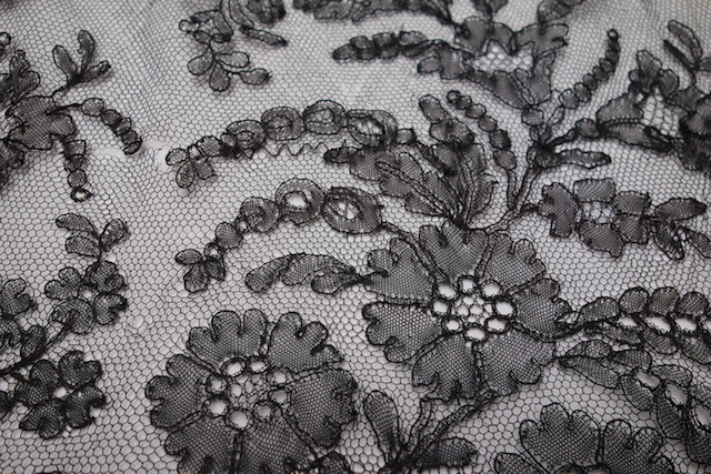 Detail of a Chantilly lace skirt flounce (c. 1870s, France; TRC 2021.1903).