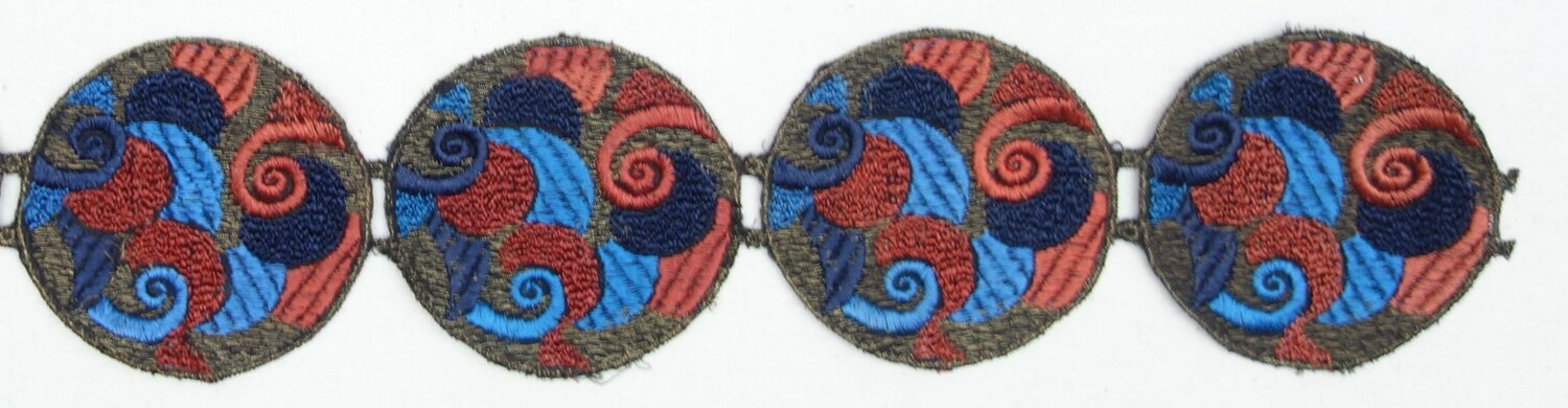 Section of a machine embroidered band, the Netherlands, 1920s-1930s (TRC 2021.2249).