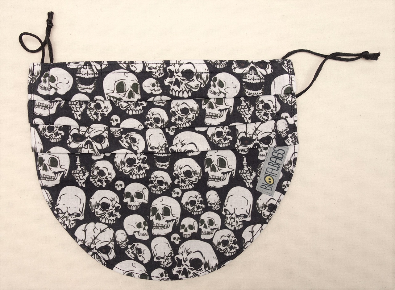 Cotton, combined face mask (corona) and beard bag with elasticated ear loops and a design of skulls. Spain (TRC 2022.0208).