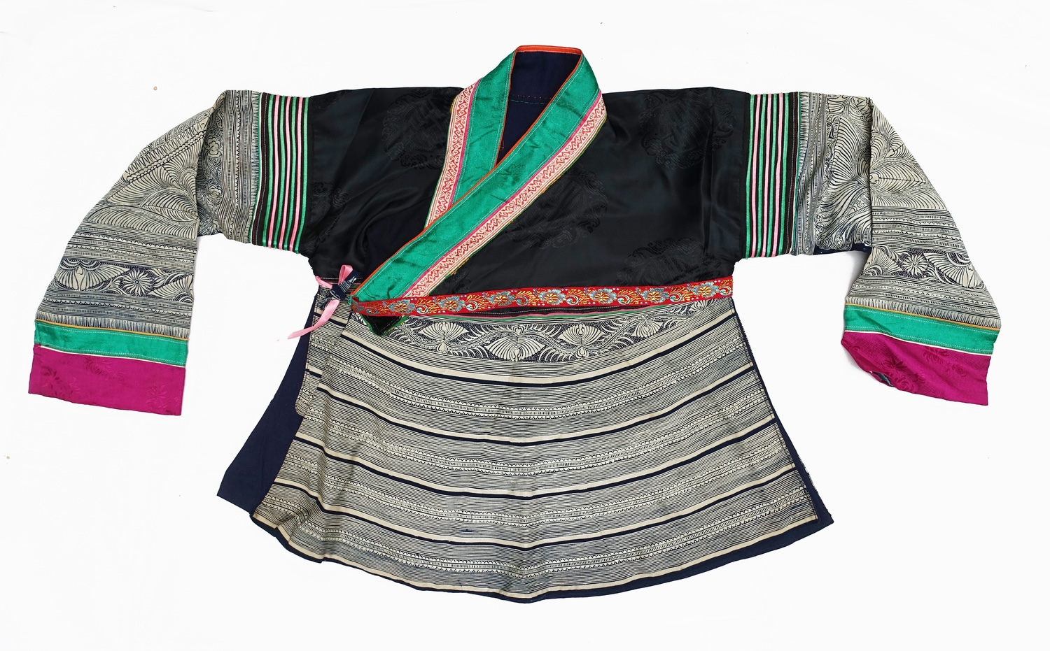 Fig. 11. Jacket, cotton, synthetic, and metal. East Guizhou Douguing, Yandongkou Miao, China, 20th century (TRC 2024.2867).