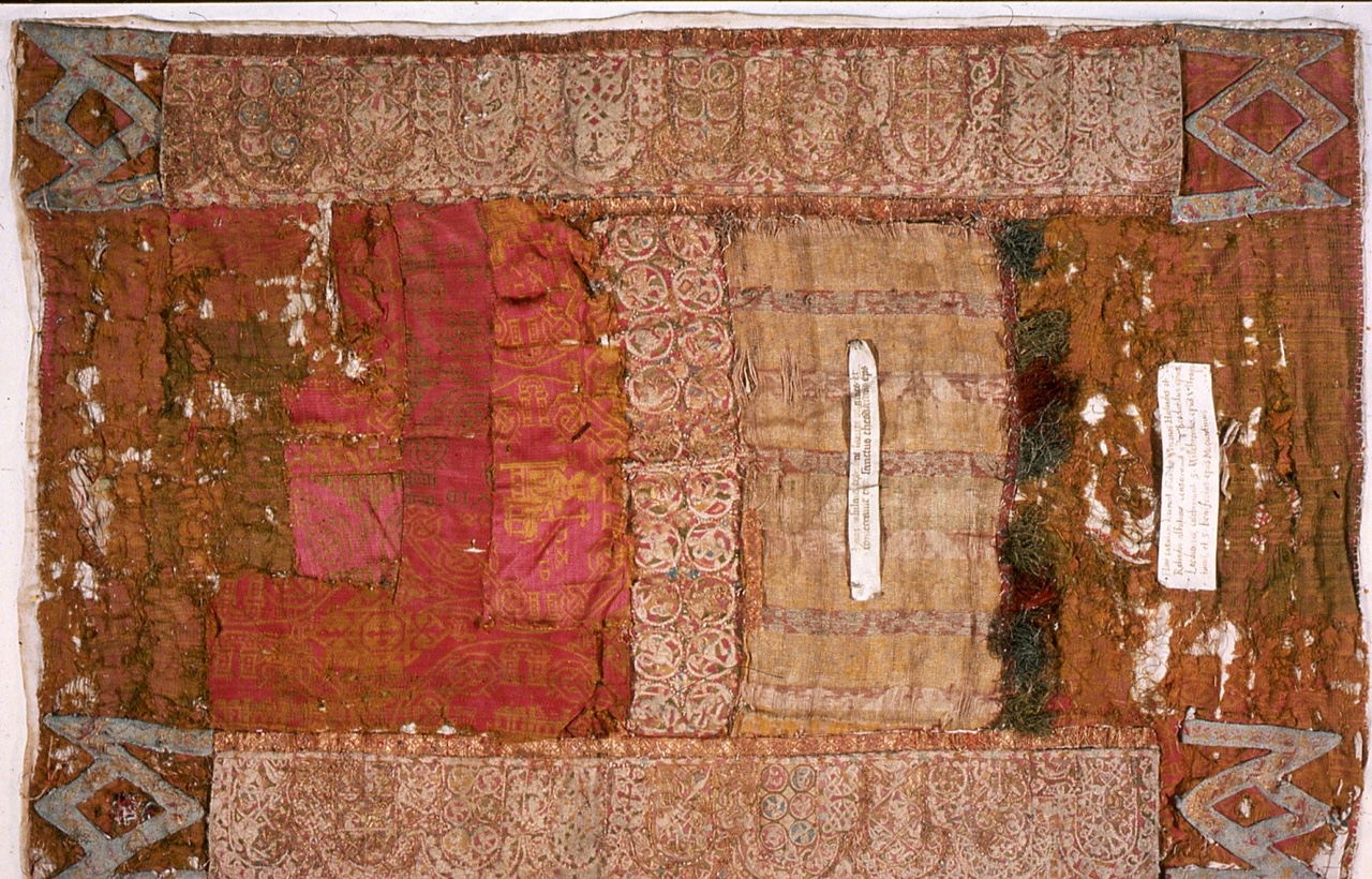 The so-called Casula of Saints Harlindis and Relindis, before conservation and separation of the constituent parts. Early medieval. Photograph courtesy of the Musea Maaseik.