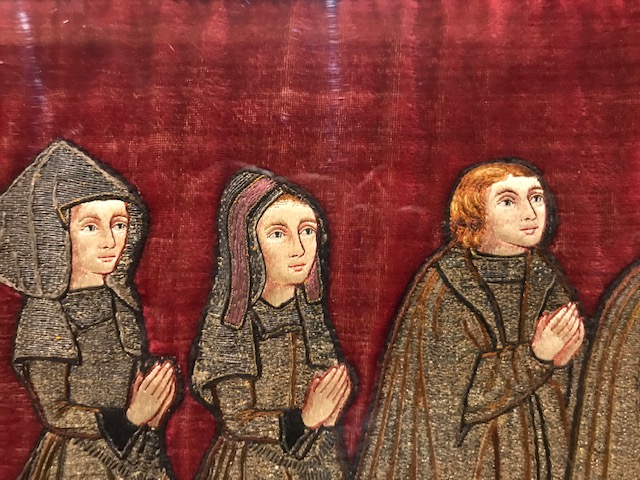Detail of an embroidered group of men and women on a long band, late medieval. Courtesy Musea Maaseik.
