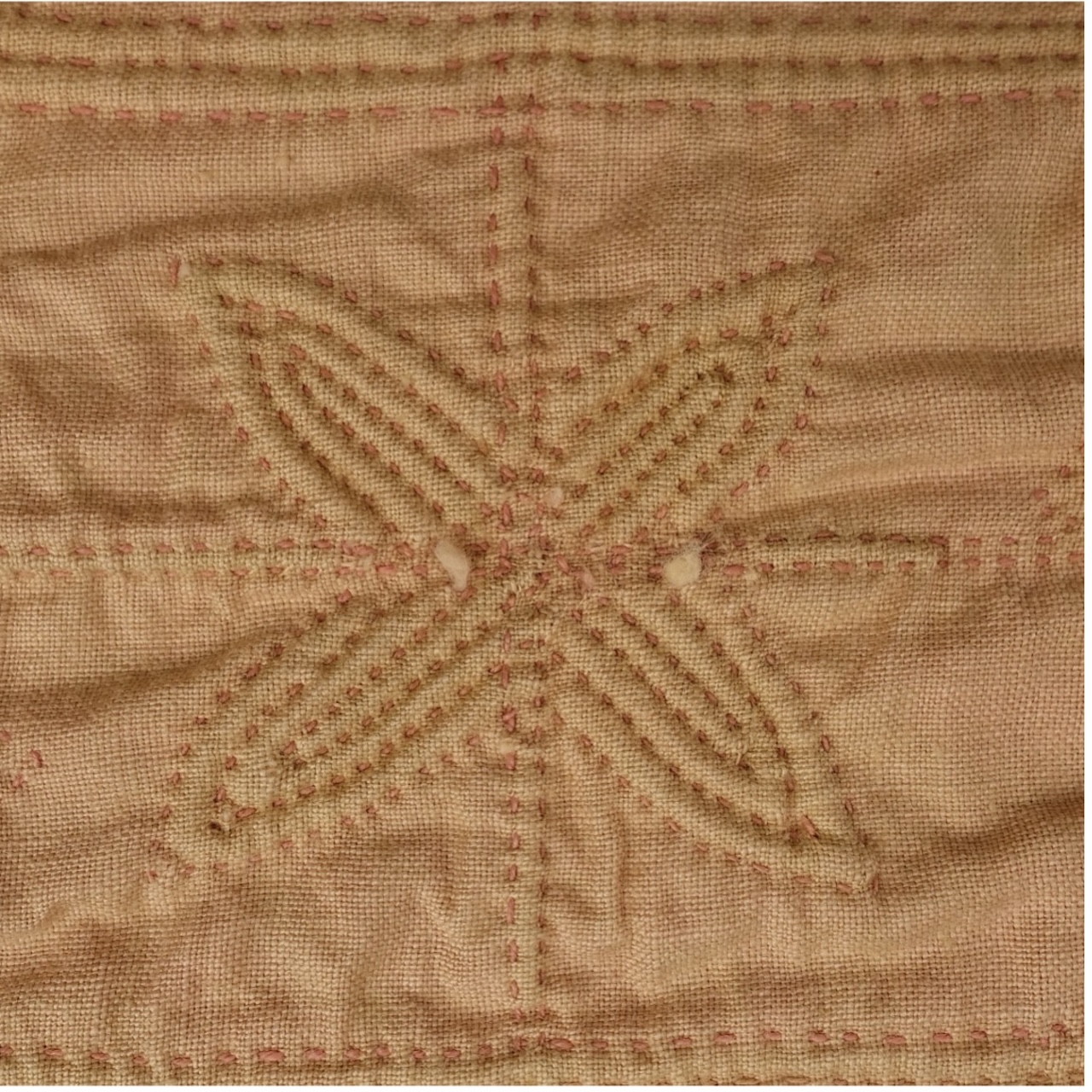 Dinolite detail of the kaftan, TRC 2026.0841.