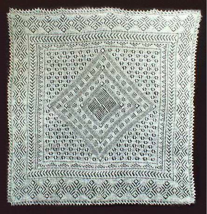 Example of an Orenburg Gossamer knitted lace shawl.
