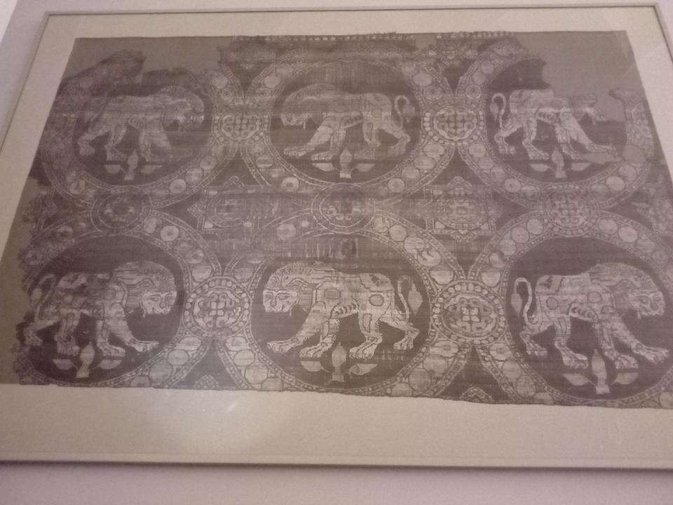 Silk textile, Byzantine, with lions within roundels, 9th-10th century, found in the coffin of Saint Julian, a fourth century Christian martyr, whose remains were kept in the church of San Giuliano in Rimini. Museo Nazionale di Ravenna.