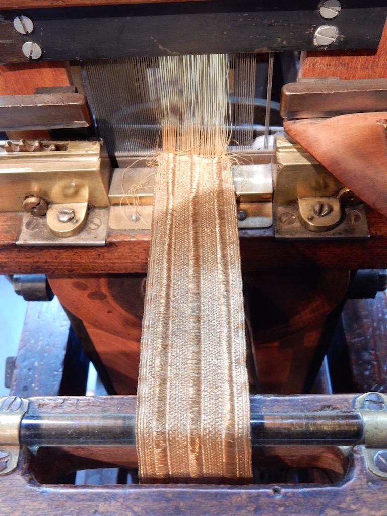 Weaving gold thread passementerie in the Maison des Canuts, Lyons. Photograph: S. Anderson.