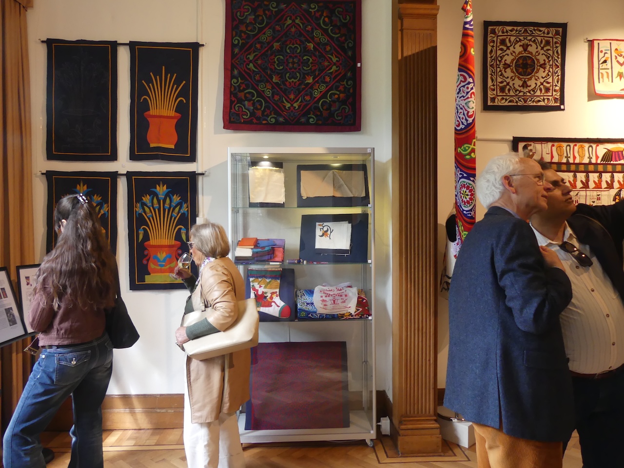 Guests looking at the exhibition. Photograph by Flora Kovacs Wester, TRC Fellow.