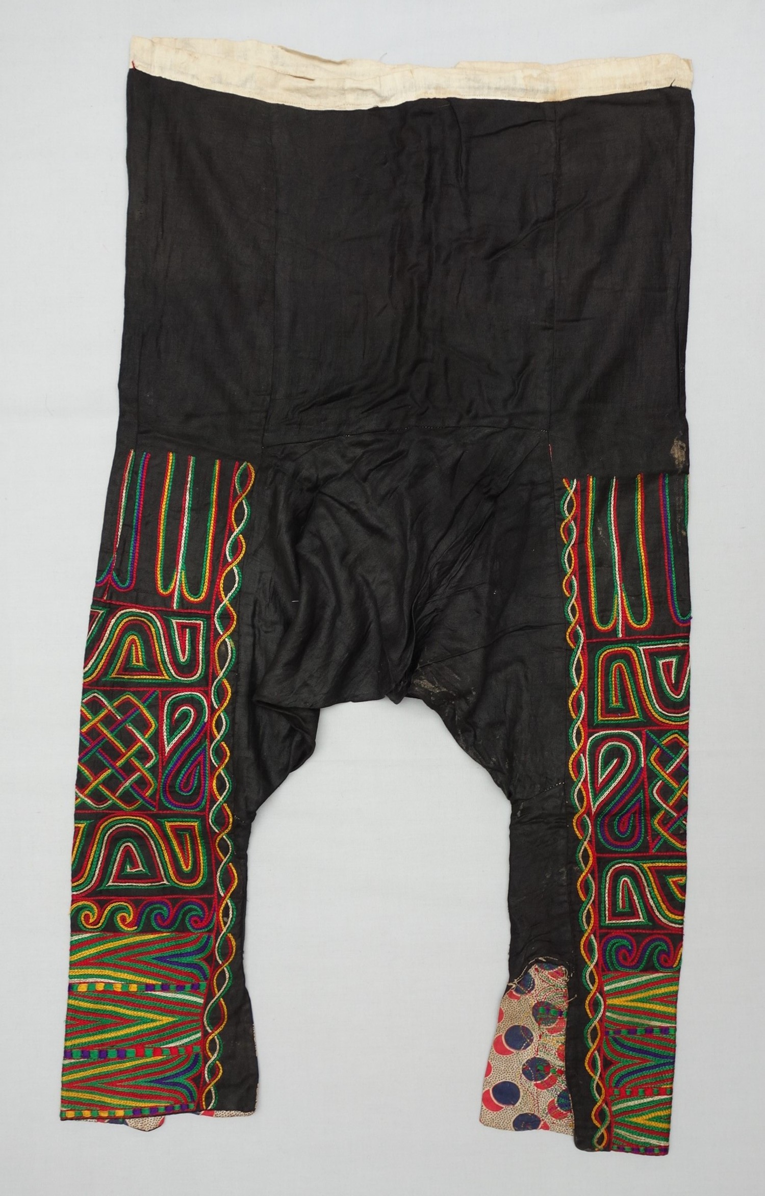 Pair of Ethiopian trousers with embroidered legs, second half 20th century. TRC 2017.2570.