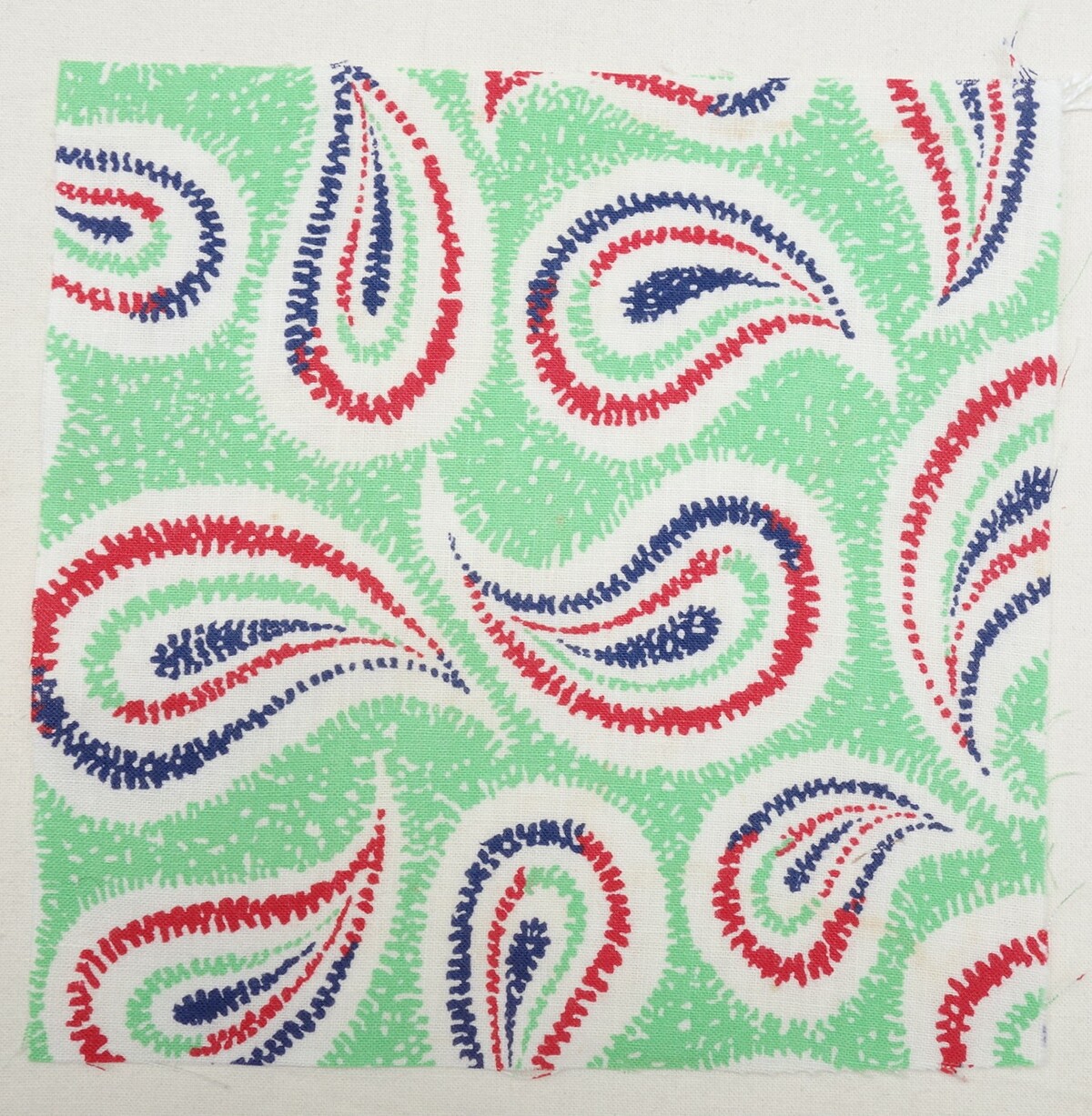 Paisley motif used on an American feedsack, 1940s (TRC 2019.1245). For more information, please click on the illustration.