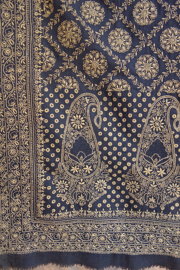 Detail of a pashmina shawl decorated with chikan embroidery, Lucknow, India (photograph 27th July 2017).