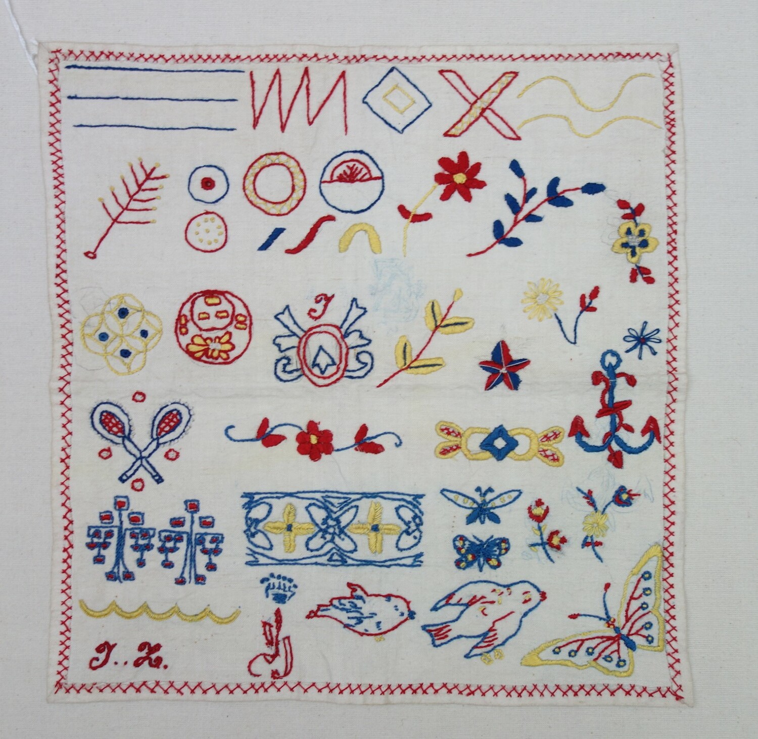 Sampler from the early 20th century, with stamped outlines for embroidered motifs (TRC 2014.0075).