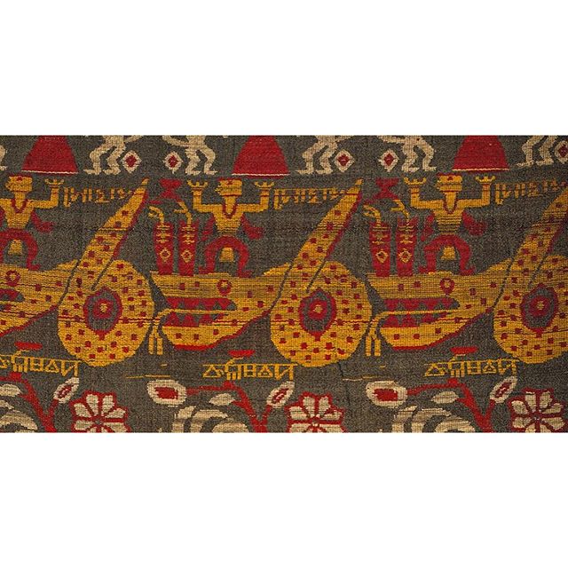 Fragment from the Vrindavani Vastra on display in the British Museum, 2016, showing the snake demon Kaliya being defeated by Krishna.