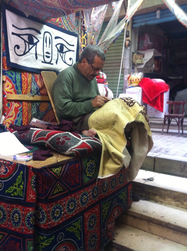 Man working on an appliqué panel, Street of the Tentmakers, Cairo, Egypt. Photograph: Gillian Vogelsang-Eastwood, December 2014.