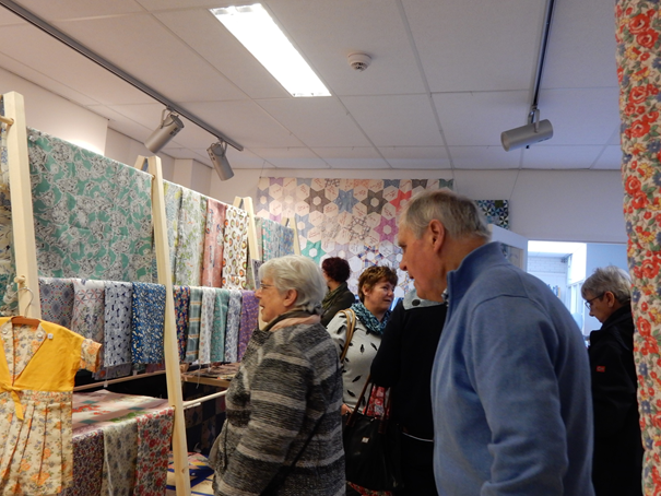 Participants to the feedsack and quilt week, inspecting the items on display. Photograph by Shelley Anderson.