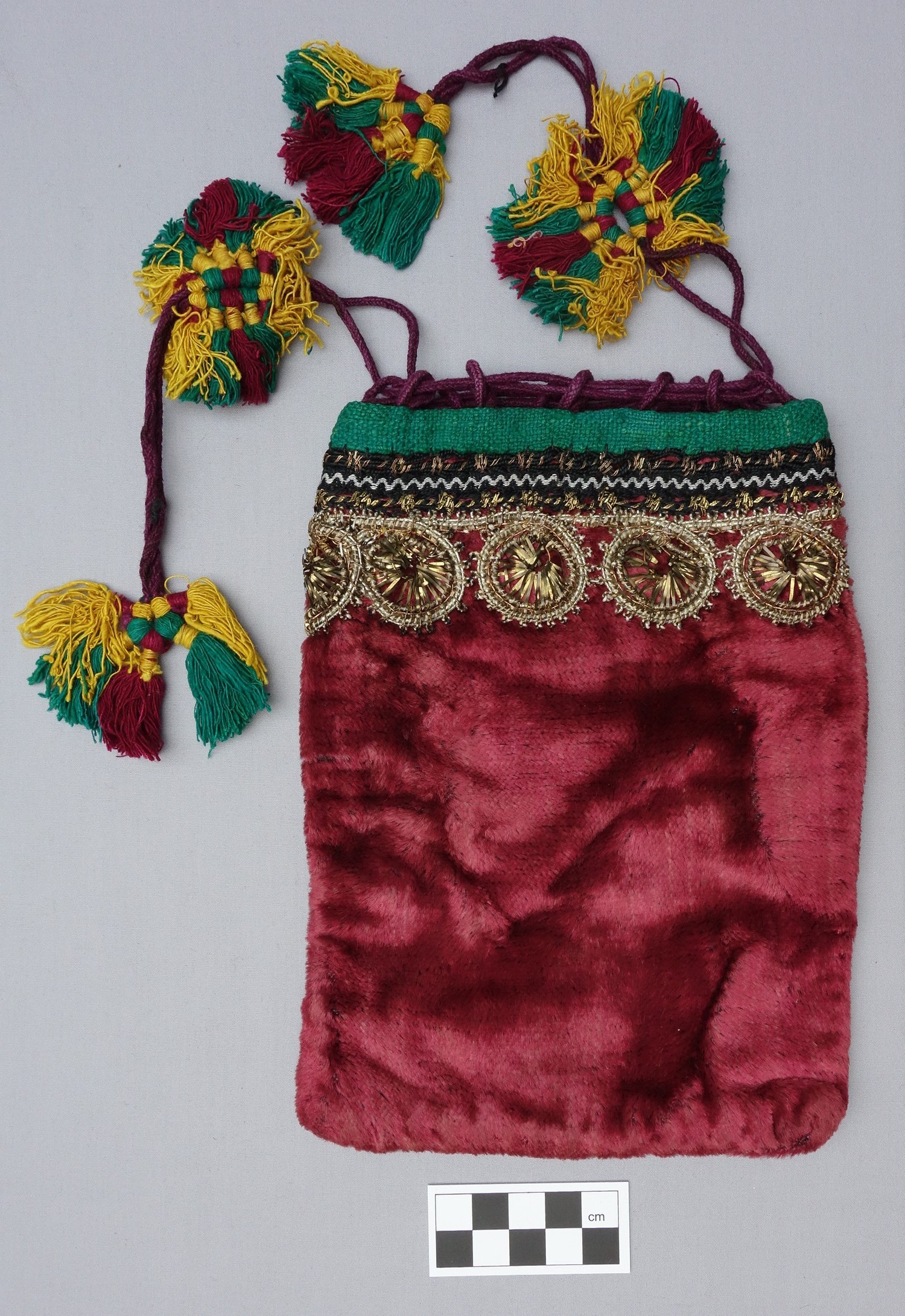 Red velvet bag from nineteenth century Iran (TRC 2002.0115).