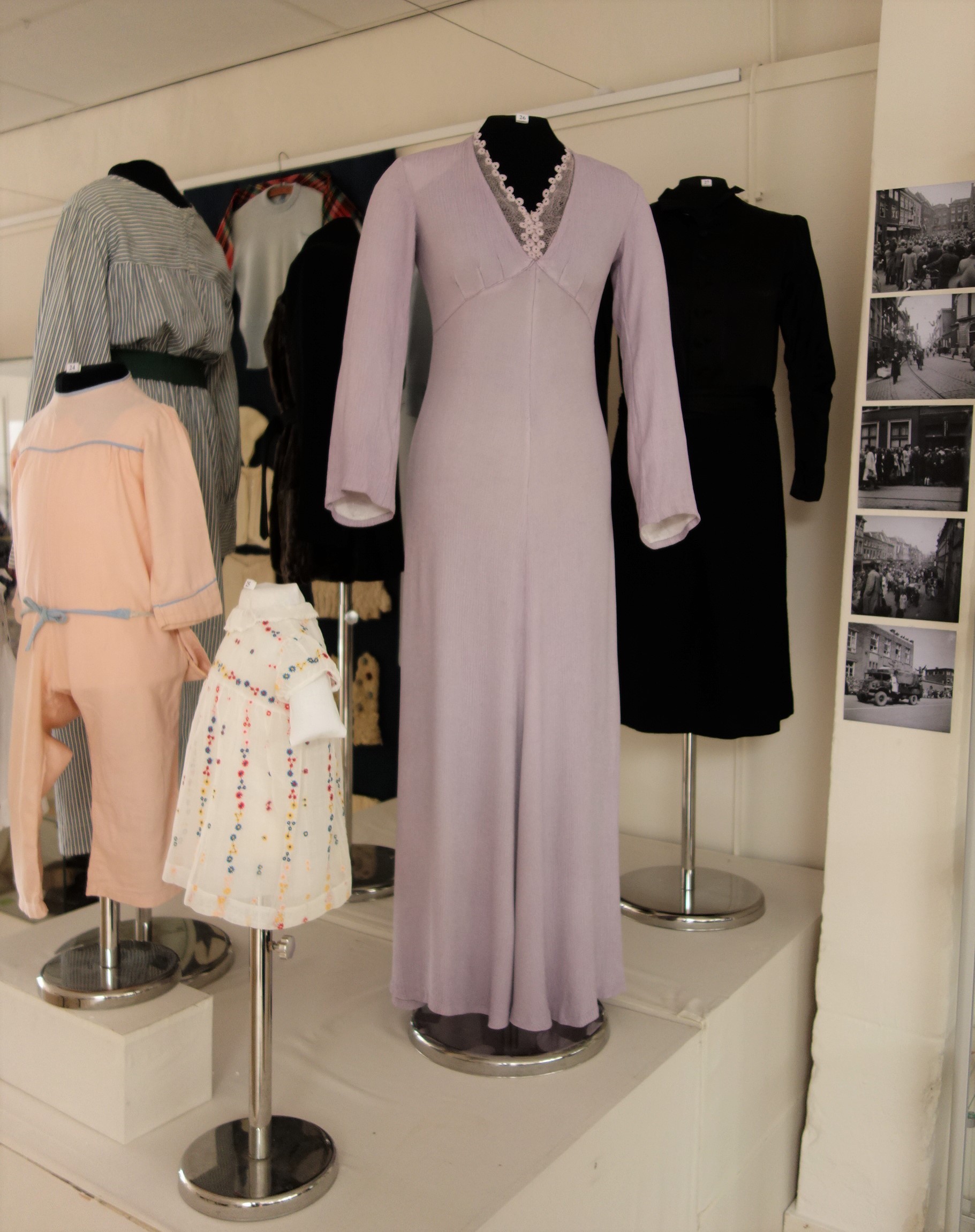A1930s wedding dress for a Leiden bride, which during the Occupation was dyed lilac to serve as a more formal dress.